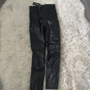 Wet seal faux leather black pants NWT size small